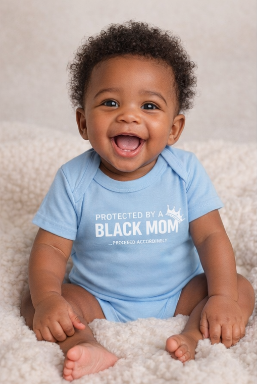 Protected by a Black Mom Infant Onesie - Baby Bodysuit