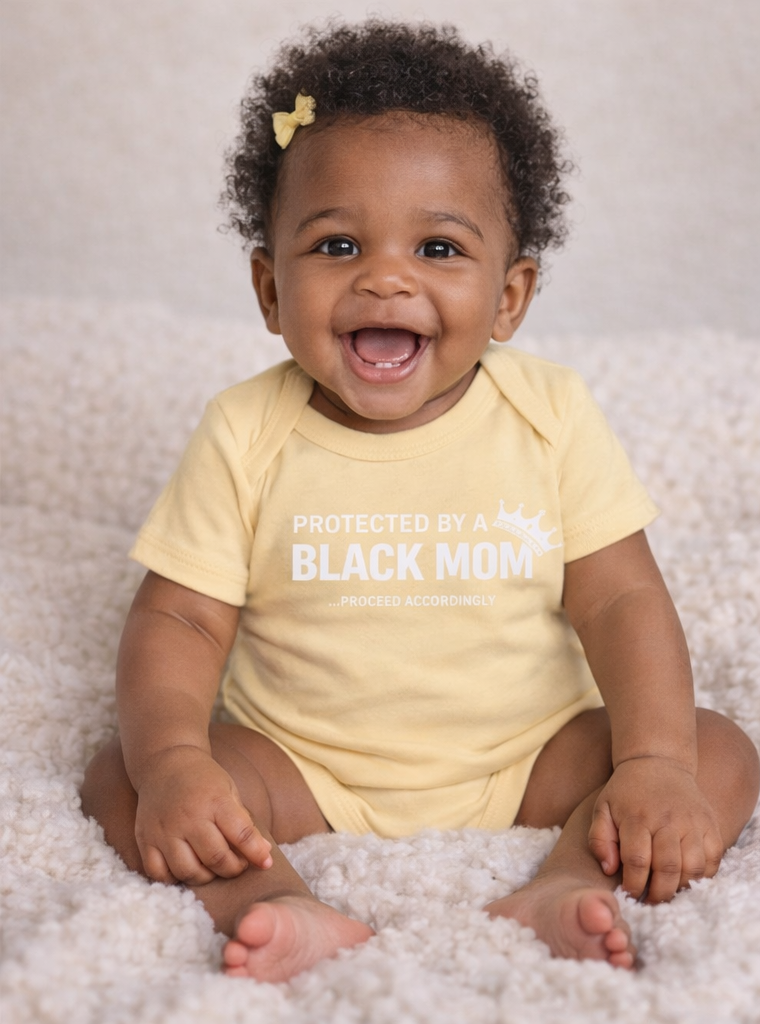 Protected by a Black Mom Infant Onesie - Baby Bodysuit