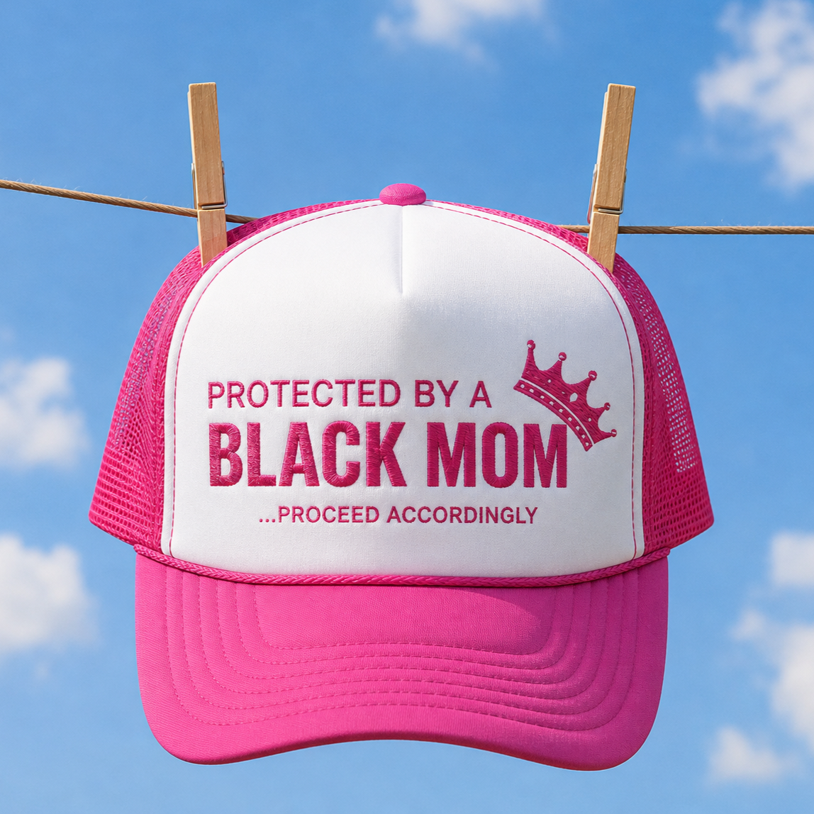 Protected by a Black Mom Trucker Hat - Pink